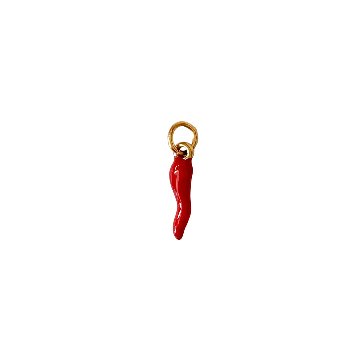 Red chili pepper charm on a gold chain against a white background