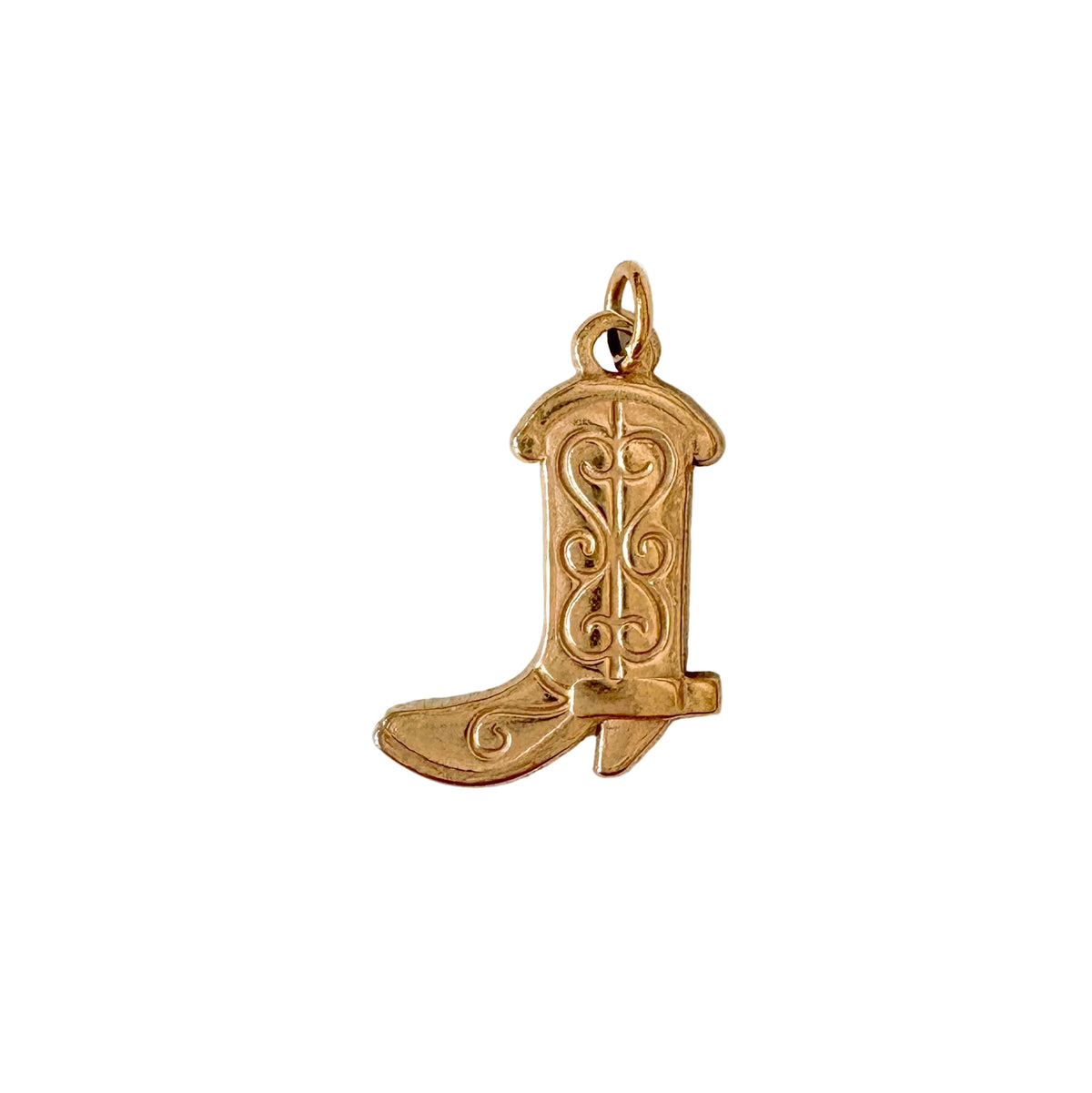 Gold cowboy boot pendant on a white background